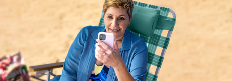 woman in chair on the beach