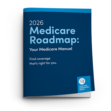 A dark blue book titled Medicare Roadmap Your Medicare Manual.