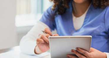 employee on a tablet working