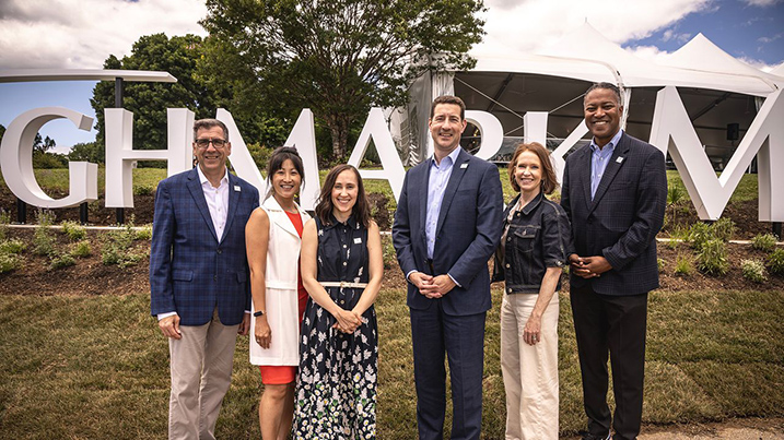 Highmark Blue Shield market president Dan Tropeano, center, cuts the ribbon for the Highmark Mann