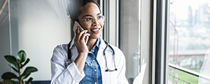 female doctor on the phone with a patient