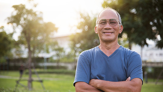 man standing outside smiling