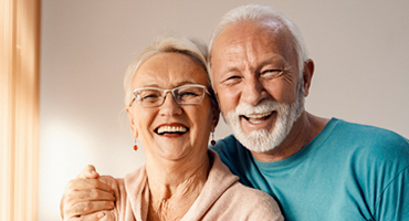 senior couple smiling