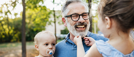 Father with infant and toddler