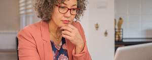 senior woman working on laptop