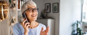 senior woman smiling on cell phone